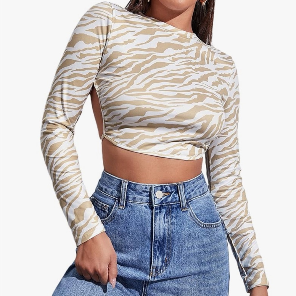 Beige and white open back long sleeved top